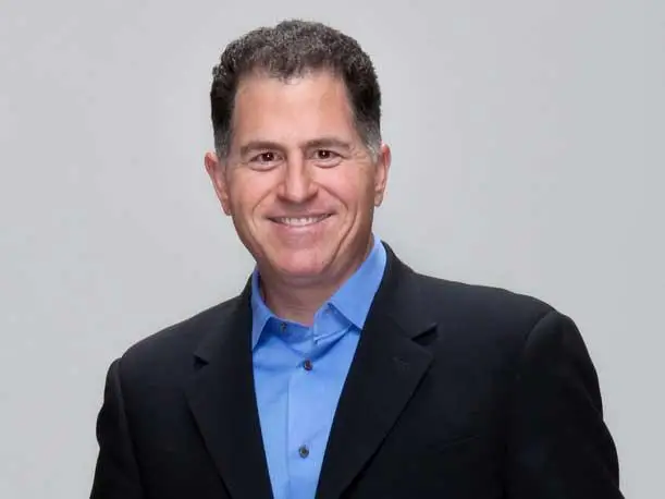 A person in a blue shirt and black suit AI-generated content may be incorrect.